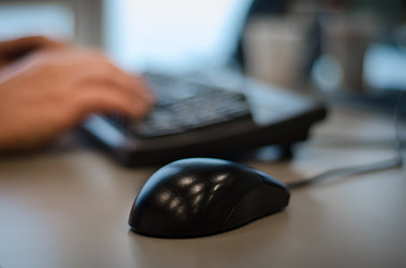black mouse beside keyboard thumbnail