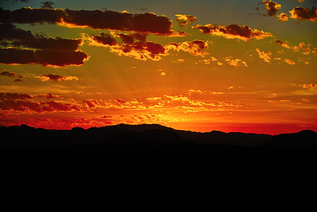 silhouette of mountain during golden hour thumbnail