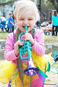 girl playing trumpet toy thumbnail