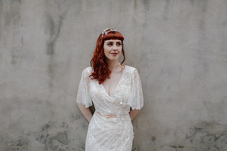 woman wearing white scoop-neck dress thumbnail