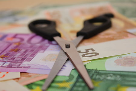 scissors on banknotes thumbnail