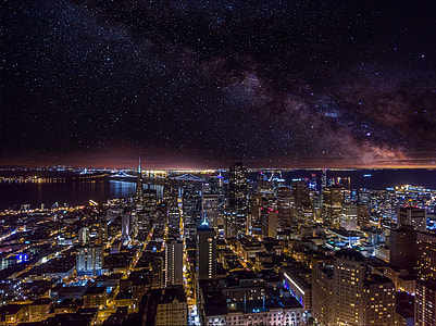 high-rise building during night time with lights turned on thumbnail