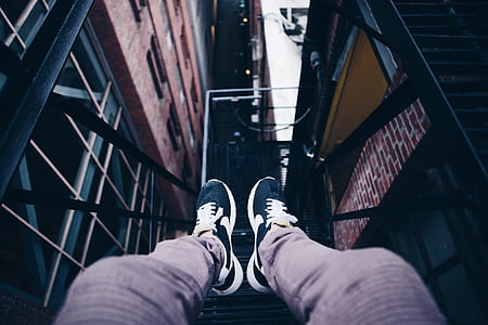 person sitting on exit ladder thumbnail