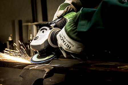 person using angle grinder thumbnail