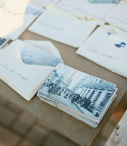 shallow focus photography of photo of people beside building thumbnail