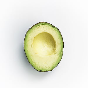 slice of avocado fruit on white surface thumbnail