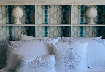 photo of four white and gray printed pillows thumbnail