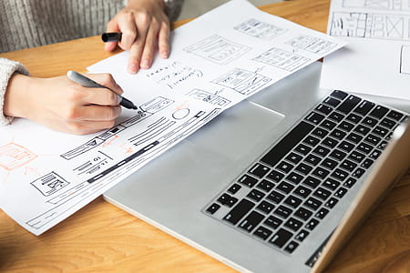 Designer Drawing Website Mockup Photo thumbnail