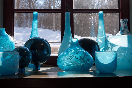 assorted-color glass vases thumbnail