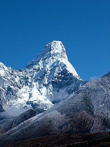 landscape photo of white and black mountain under blue sky at daytime thumbnail