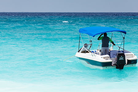 man riding outboard boat thumbnail