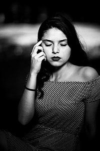 grayscale photography of woman in off shoulder dress thumbnail