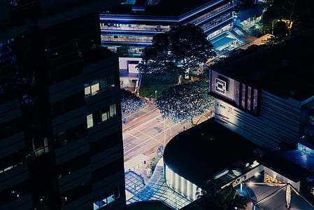 high angle photo of building near trees and road thumbnail