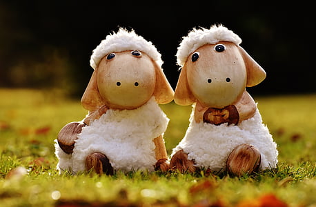 two white sheep figurines thumbnail