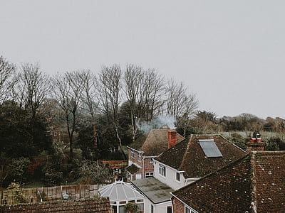 white and brown concrete house during daytime thumbnail