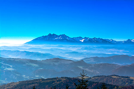 silhouette of mountains during daytime thumbnail