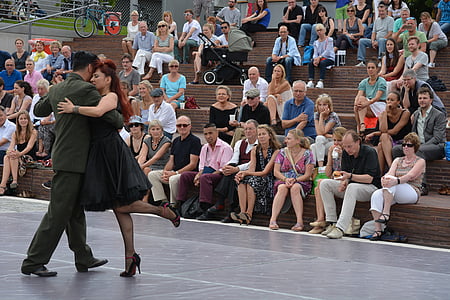 woman and man dancing in front of audiences thumbnail