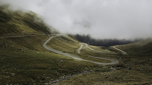 pathway through the mountains with fog thumbnail