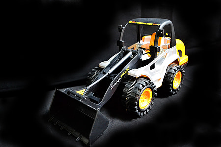 yellow and black front loader toy thumbnail