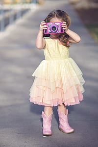 girl using purple camera thumbnail