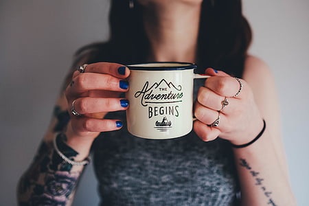 white and blue ceramic mug thumbnail