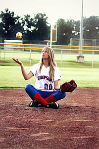 girl holding brown baseball glove thumbnail