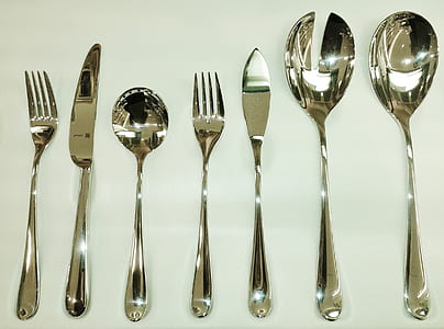 gray steel utensil set on white surface thumbnail