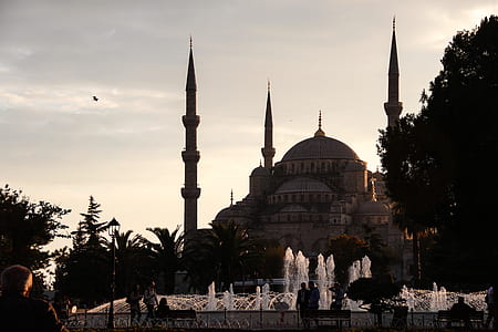 silhouette photography of brown concrete mosque thumbnail