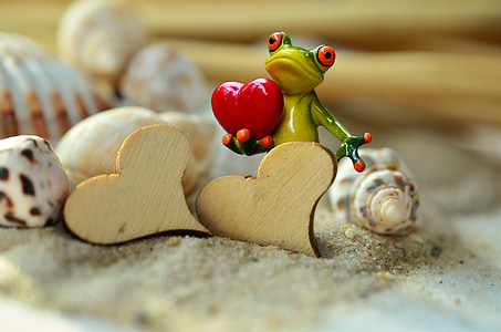 green ceramic frog figurine thumbnail