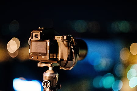 black DSLR camera thumbnail