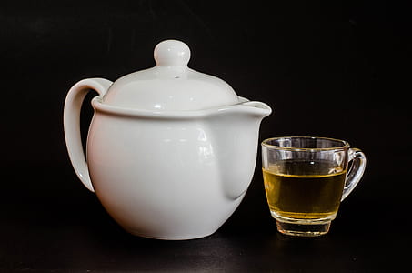 white ceramic pitcher on black surface thumbnail