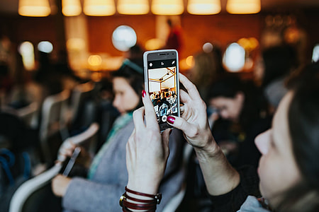 People taking photos with smartphones thumbnail