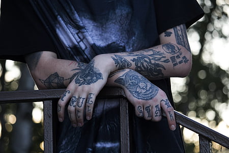 person wearing black T-shirt thumbnail