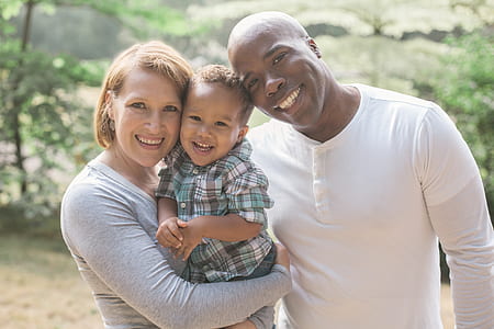 family of three taking photograph thumbnail