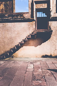brown staircase leading to door thumbnail