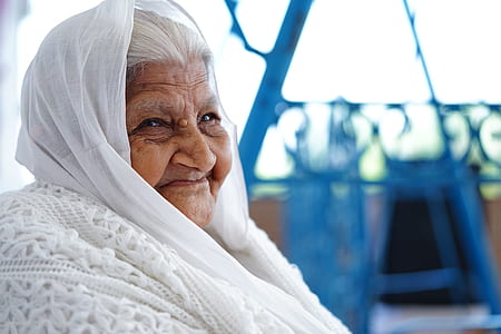 woman sitting while smiling thumbnail