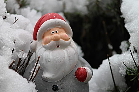white dressed santa claus figurine thumbnail