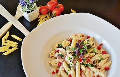 fusilli pasta on white plate thumbnail
