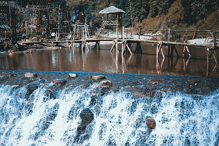 Brown Wooden Bridge on the River Photography thumbnail