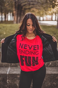Woman Holding Jacket Looking Down thumbnail