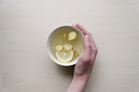 person hold white ceramic mug thumbnail
