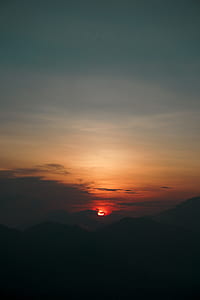 silhouette of mountain during sunset thumbnail