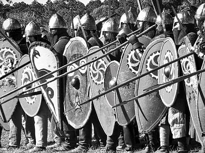 grayscale of knights during daytime thumbnail