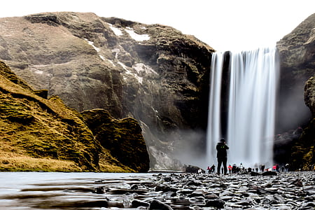 group people near waterfalls thumbnail