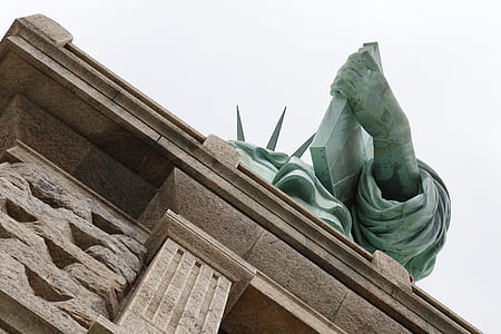 worm's eye view photography of Statue of Liberty thumbnail