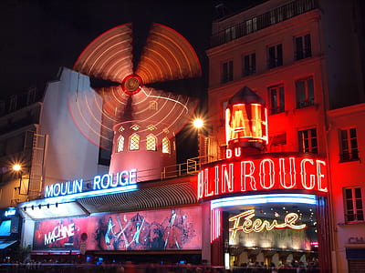 lighted Moulin Rough sign during nighttime thumbnail