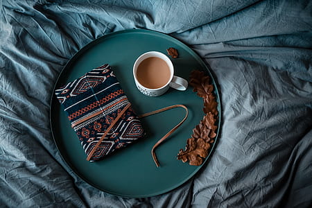 cup filled with coffee on tray thumbnail