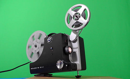 black and gray film projector with green background thumbnail