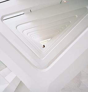 shallow focus photography of triangular white conrete stairset thumbnail