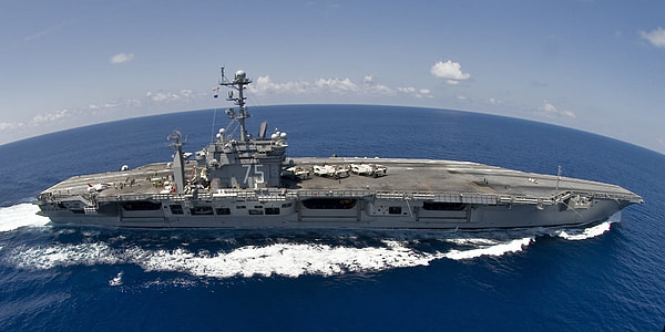 gray battleship on body of water thumbnail
